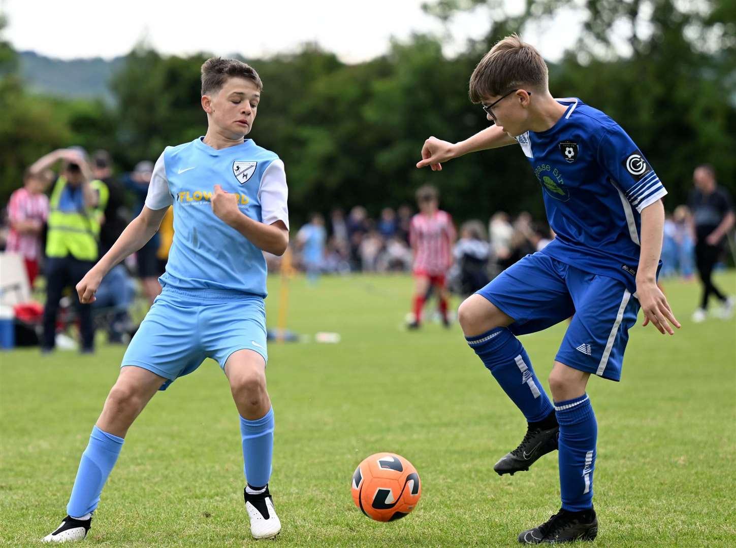 Broadstairs Town FC Colts (dark blue) and Kennington Juniors Under-13s will continue their grassroots journey with participation for all in mind. Picture: Barry Goodwin