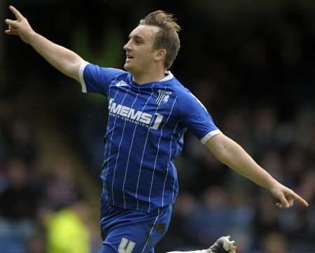 Charlie Lee celebrates his second goal against Morecambe