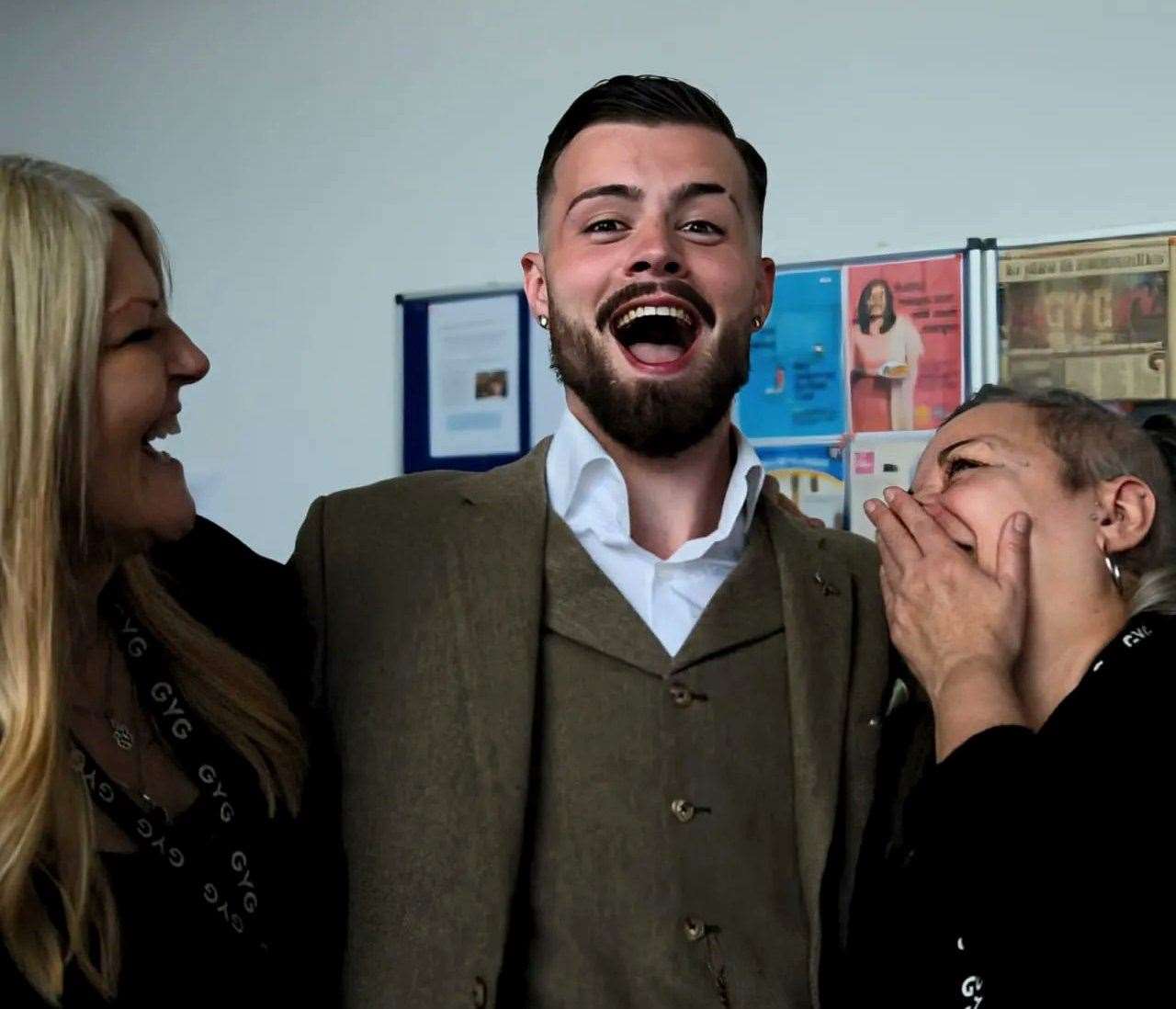 Harrison Pettman with colleagues at GYG in Wilfred Street, Gravesend. Photo credit: Carl Webster-Dowsing