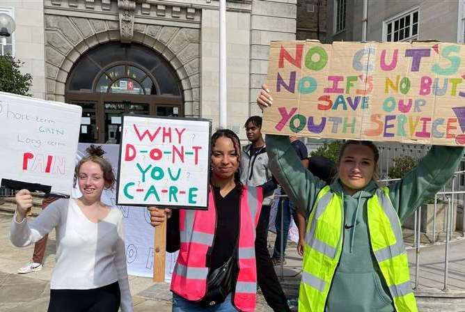 Young people protesting about the cuts outside County Hall in Maidstone