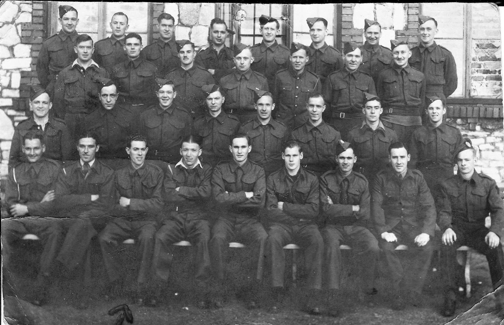 Inside Stalag VIIIB. Ron is bottom row, third left