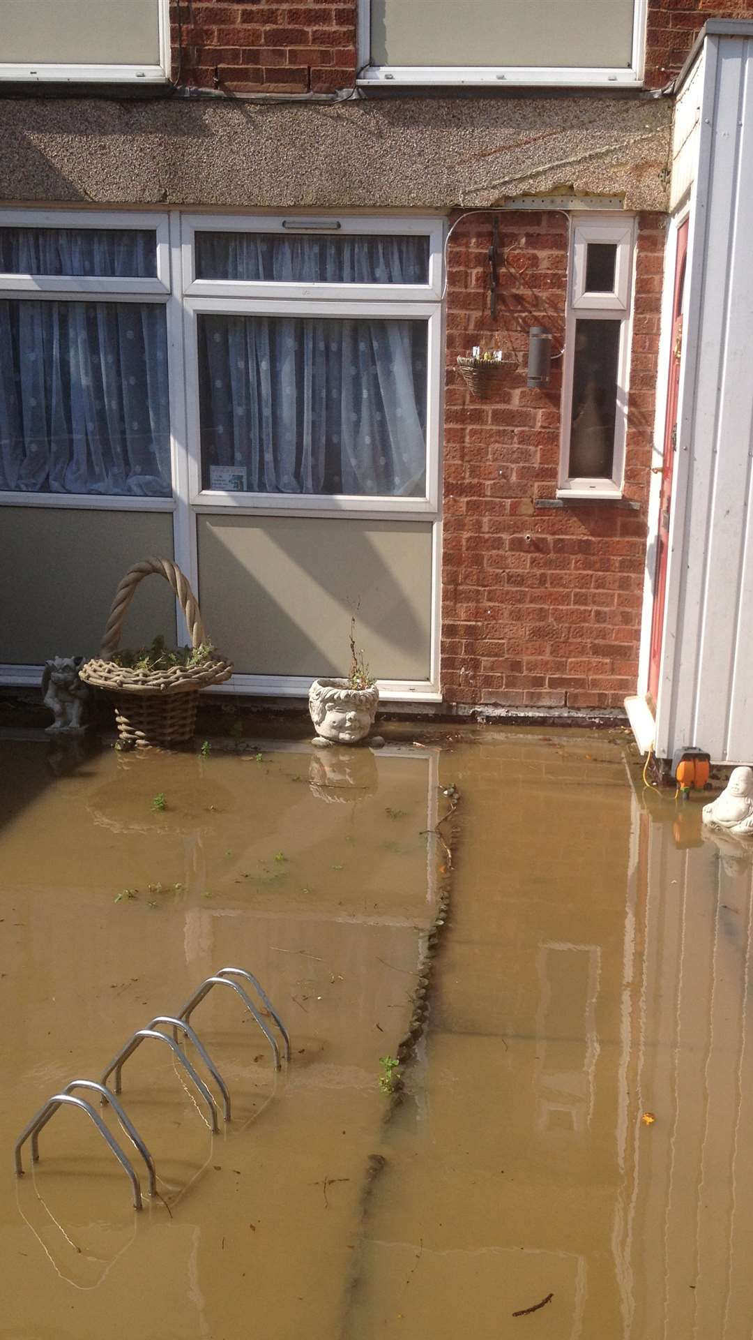 More than a foot of sewage swept into gardens in Seasalter