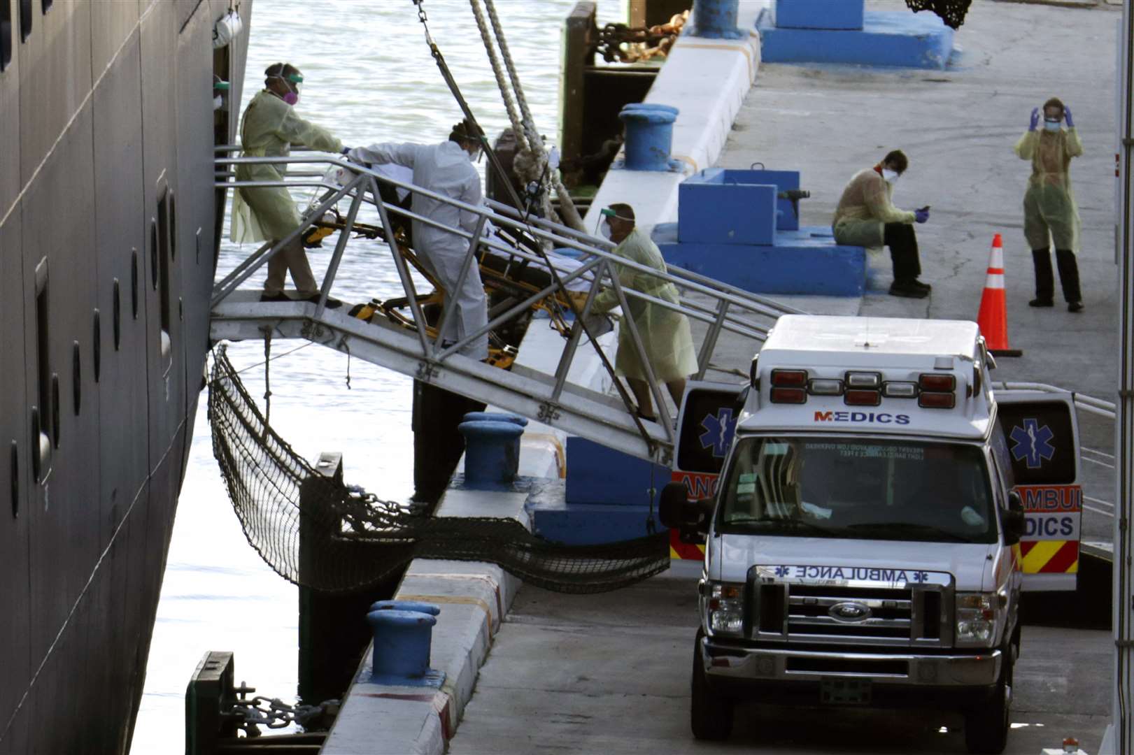 A person on a stretcher is removed from the Zaandam (Lynne Sladky/AP)