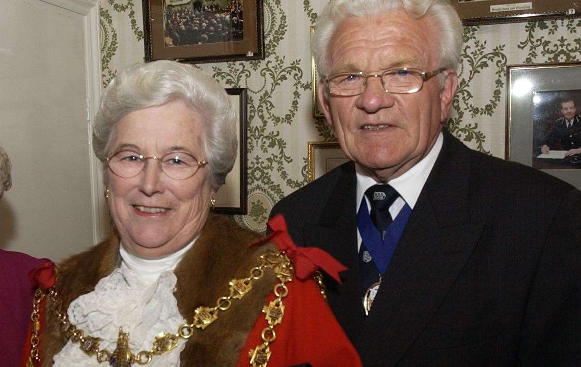 Mrs Palmer pictured with escort husband Ken. Picture: Dave Downey