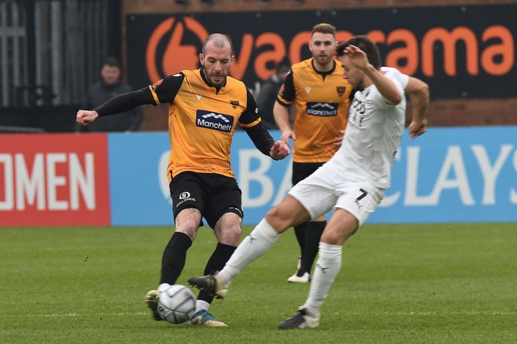 Joe Ellul battles with Josh Rees at Boreham Wood last weekend Picture: Steve Terrell