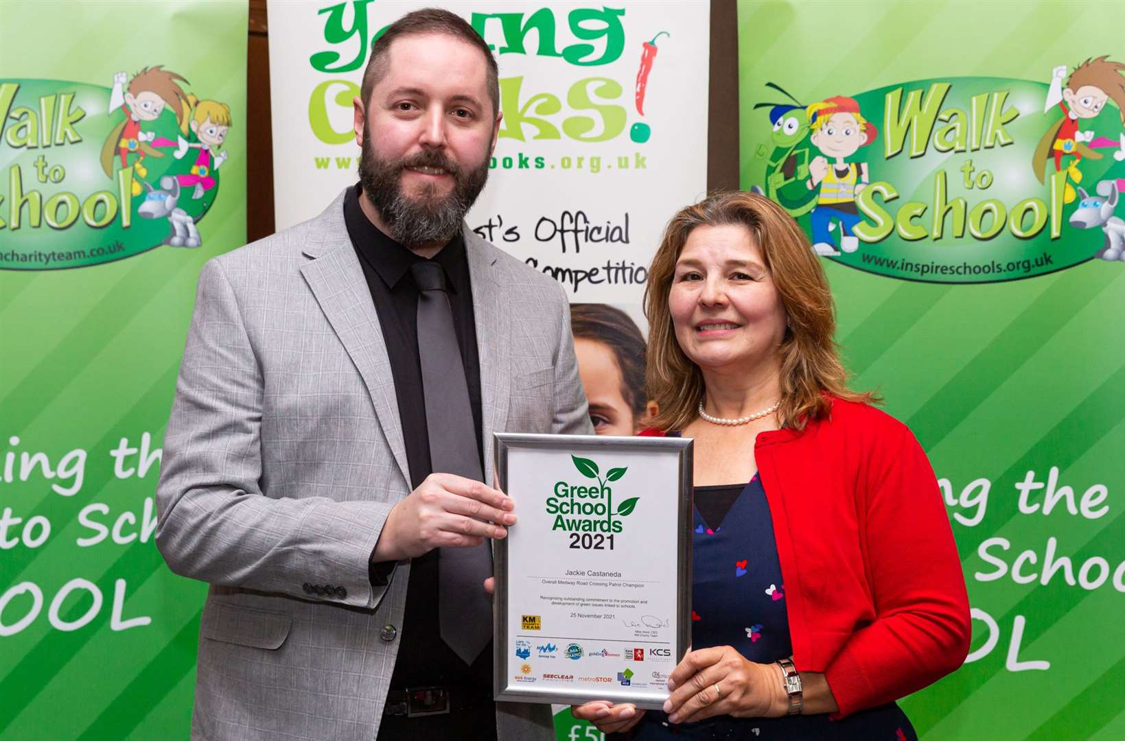 Jackie Castaneda who serves both Rainham School for Girls and The Howard School receives her Road Crossing Patrol award at the KM Charity Team's Green School Awards Picture: Countrywide Photographic