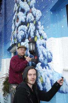 Mural artists outside the Hawkenbury