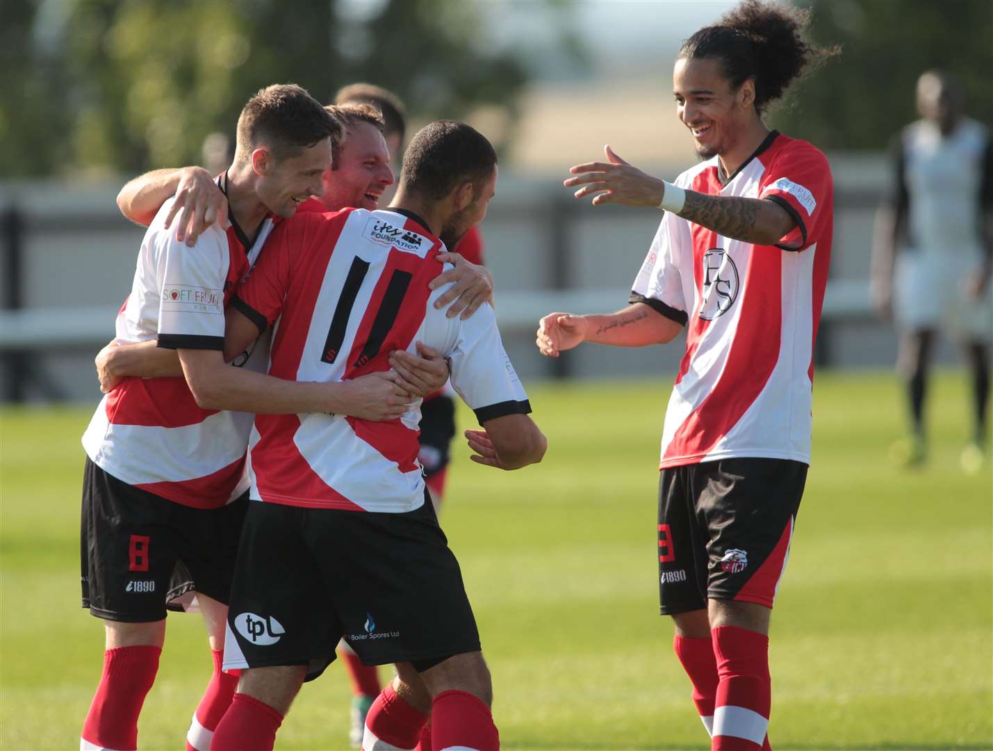 Hicham Akhazzan (No.11) celebrates scoring for Sheppey Picture: John Westhrop