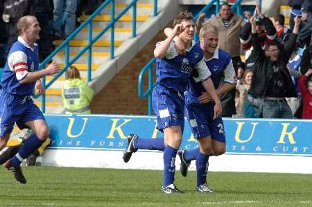 GOLDEN GOAL: Darius Henderson's superb winner gave Gillingham another vital three points. Picture: GRANT FALVEY