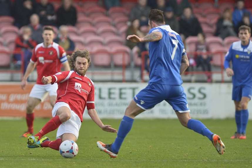 Daryl McMahon tackles Bishop's Stortford's Matt Johnson (Pic: Andy Payton)