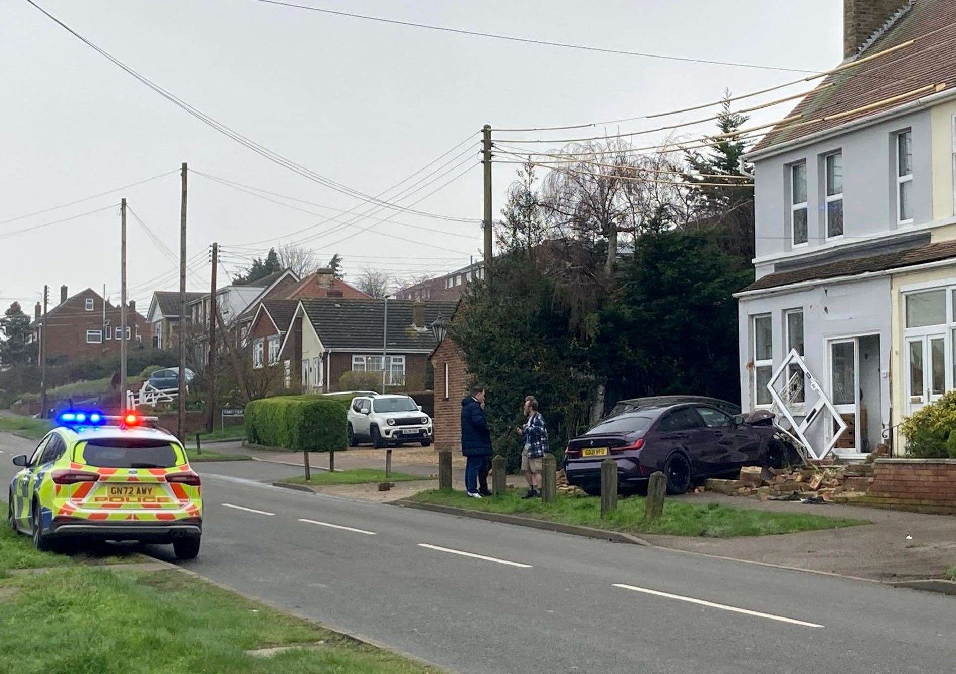 A BMW smashed into a couple's front room in The Broadway, Minster, on Monday morning. Picture: John Nurden