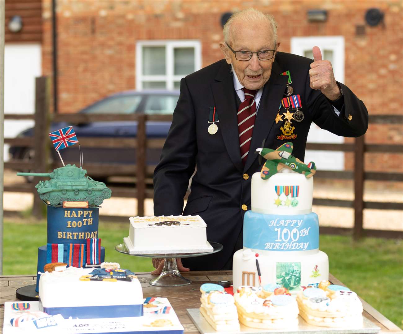 Second World War veteran Captain Tom Moore in the garden of his home in Maids Moreton (Emma Sohl/Capture the Light Photography/PA)