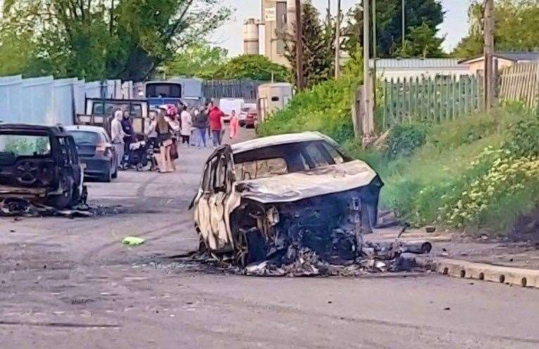 Two cars were destroyed by fire as police attended an incident in Dering Way, Denton. Picture: Kent Police