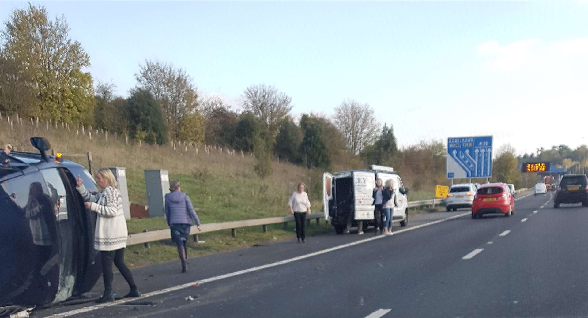 A car has overturned on the hard shoulder (5030231)