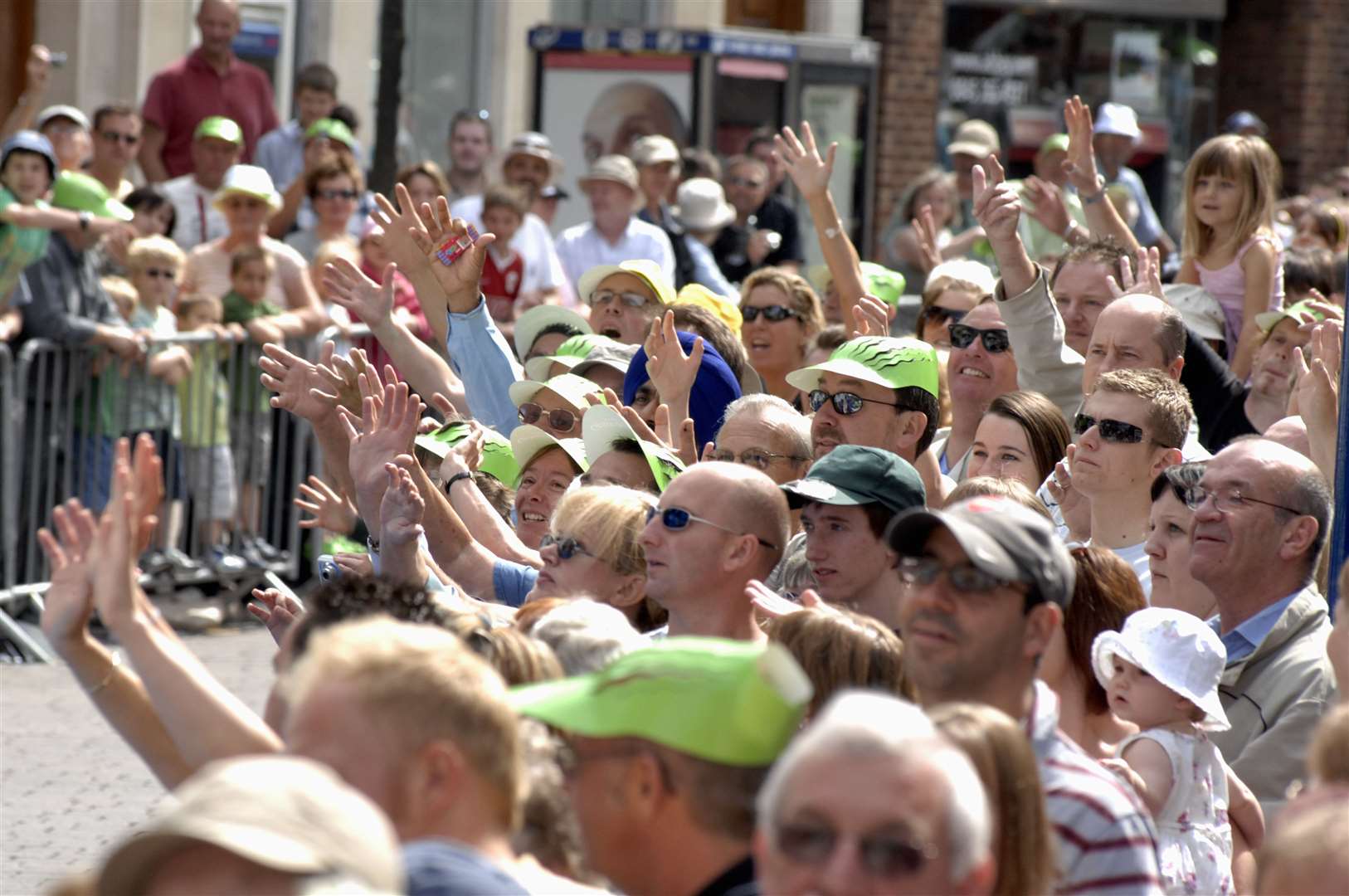 Gravesend crowds try to grab freebies. Pic: Grant Falvey