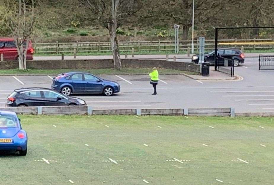 Council officials dealing with drivers who had been locked in at the Kearsney Abbey car park, photographed on March 6. Picture: Jim Winter