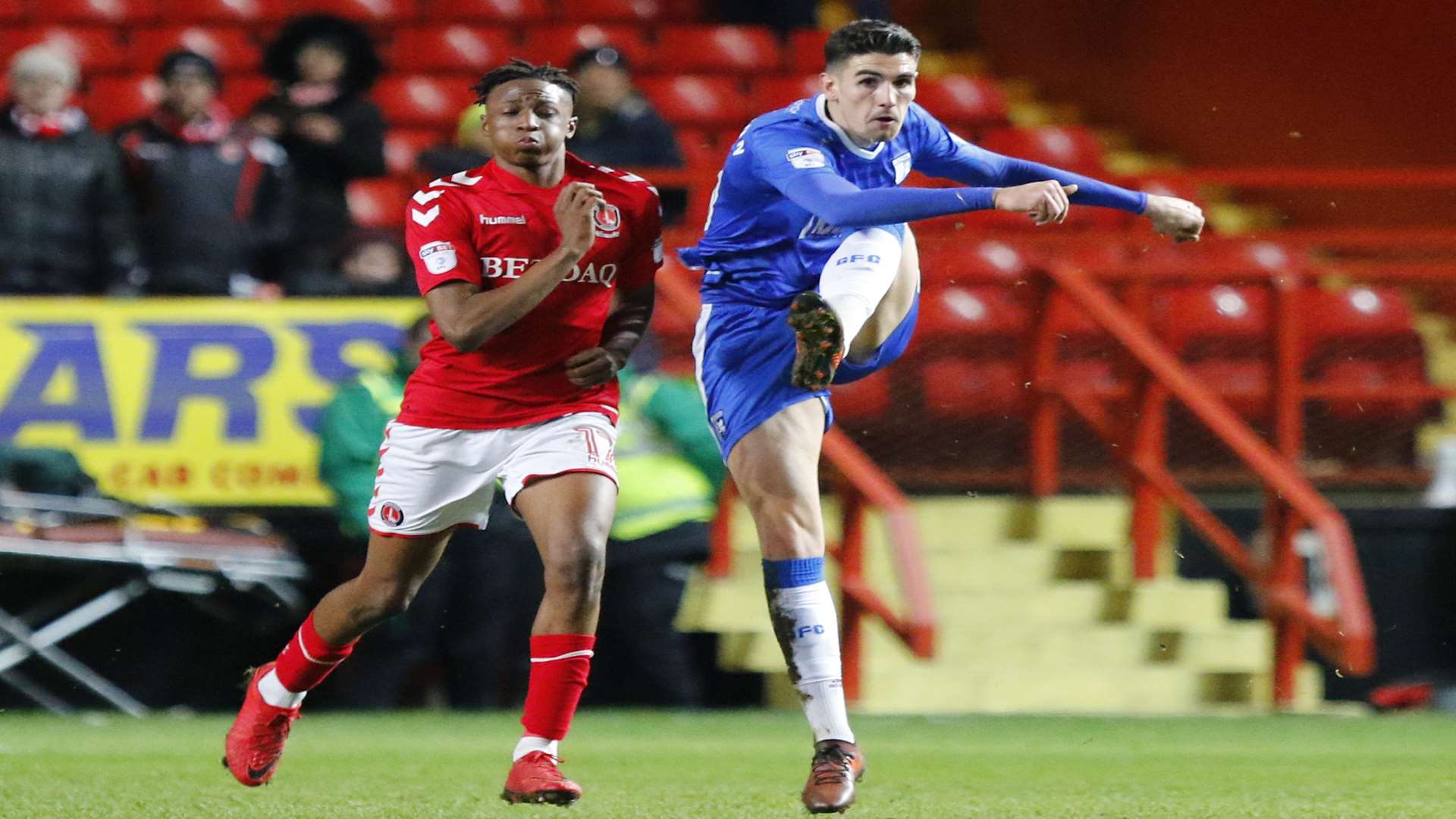 Conor Wilkinson does battle for the visitors Picture: Andy Jones