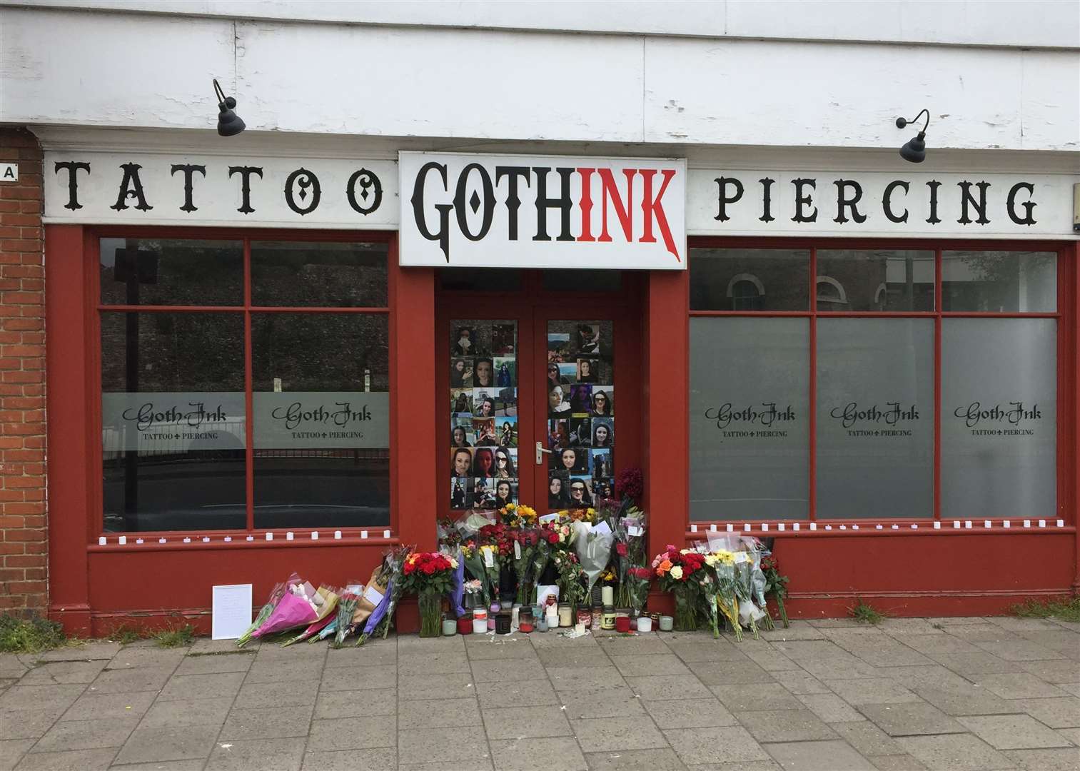 Tributes to Ramona Stoia, 35, outside the GothInk tattoo parlour in Canterbury