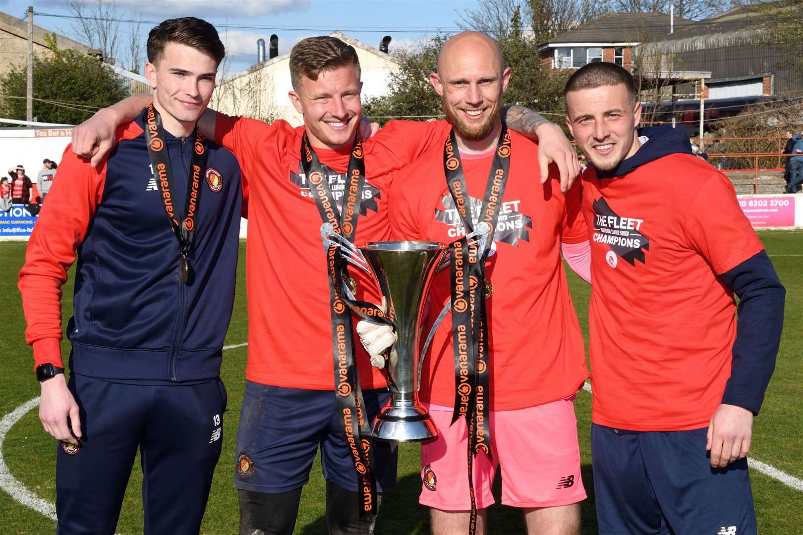 Chris Haigh, second left, is all smiles alongside fellow goalkeepers Harrison Firth and Mark Cousins plus goalkeeper coach Jeff Richardson when Ebbsfleet celebrated winning National League South. Picture: Simon Hildrew