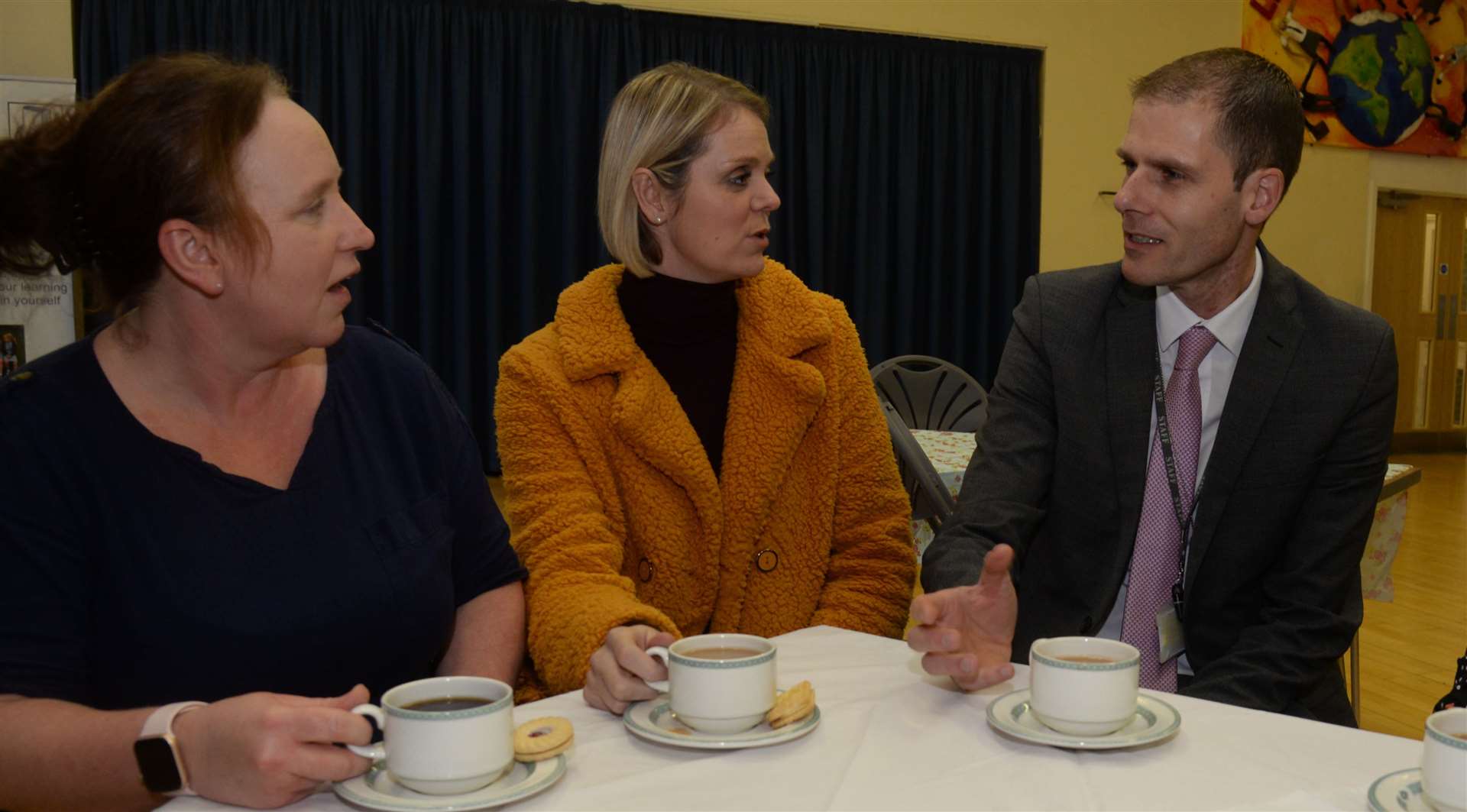 Darren Webb, with staff at St Katherine's School, Snodland, during a coffee afternoon