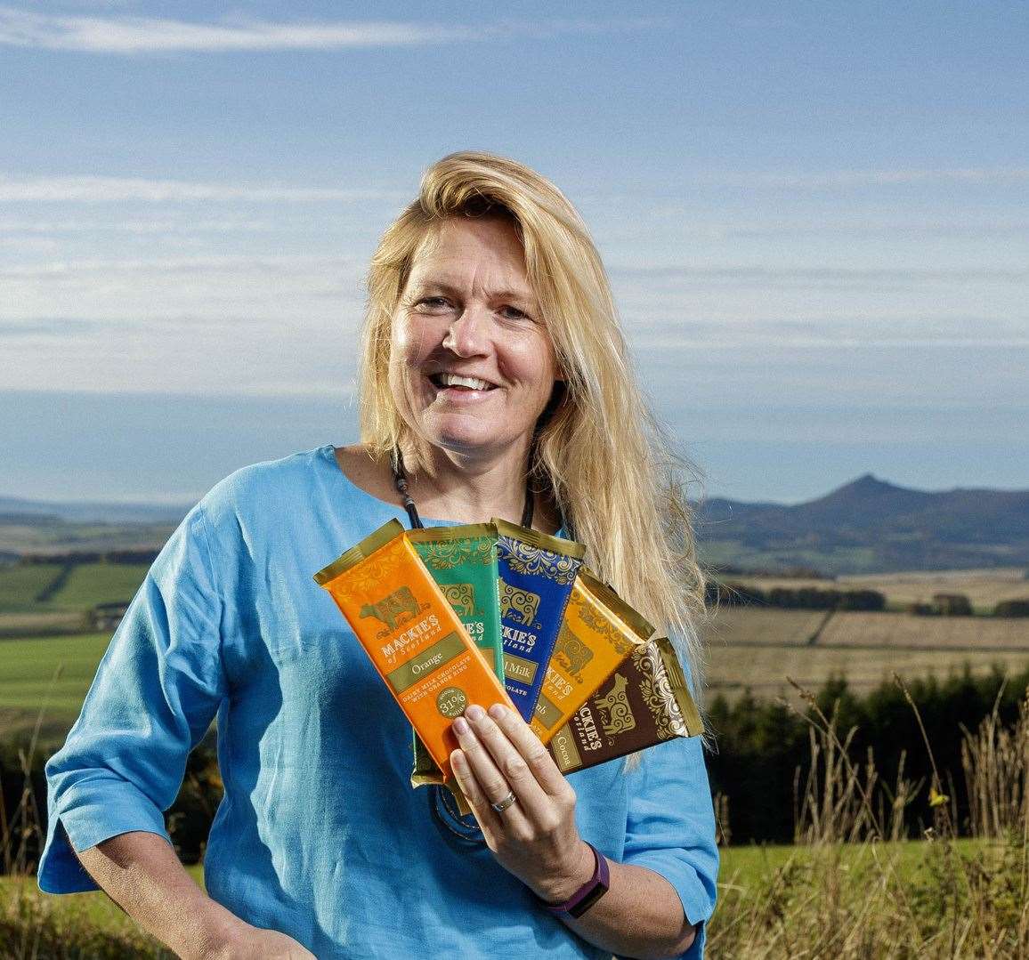 Kirstin Mackie, development director for Mackie's of Scotland, holding the finished product Derek has helped develop. Picture: Ross Johnston/Newsline Media