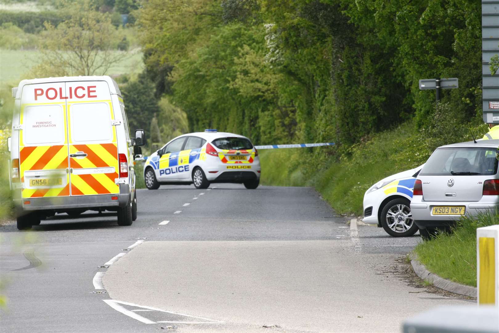 Police in the area where Mariola (Mika) Cudworth's body was found