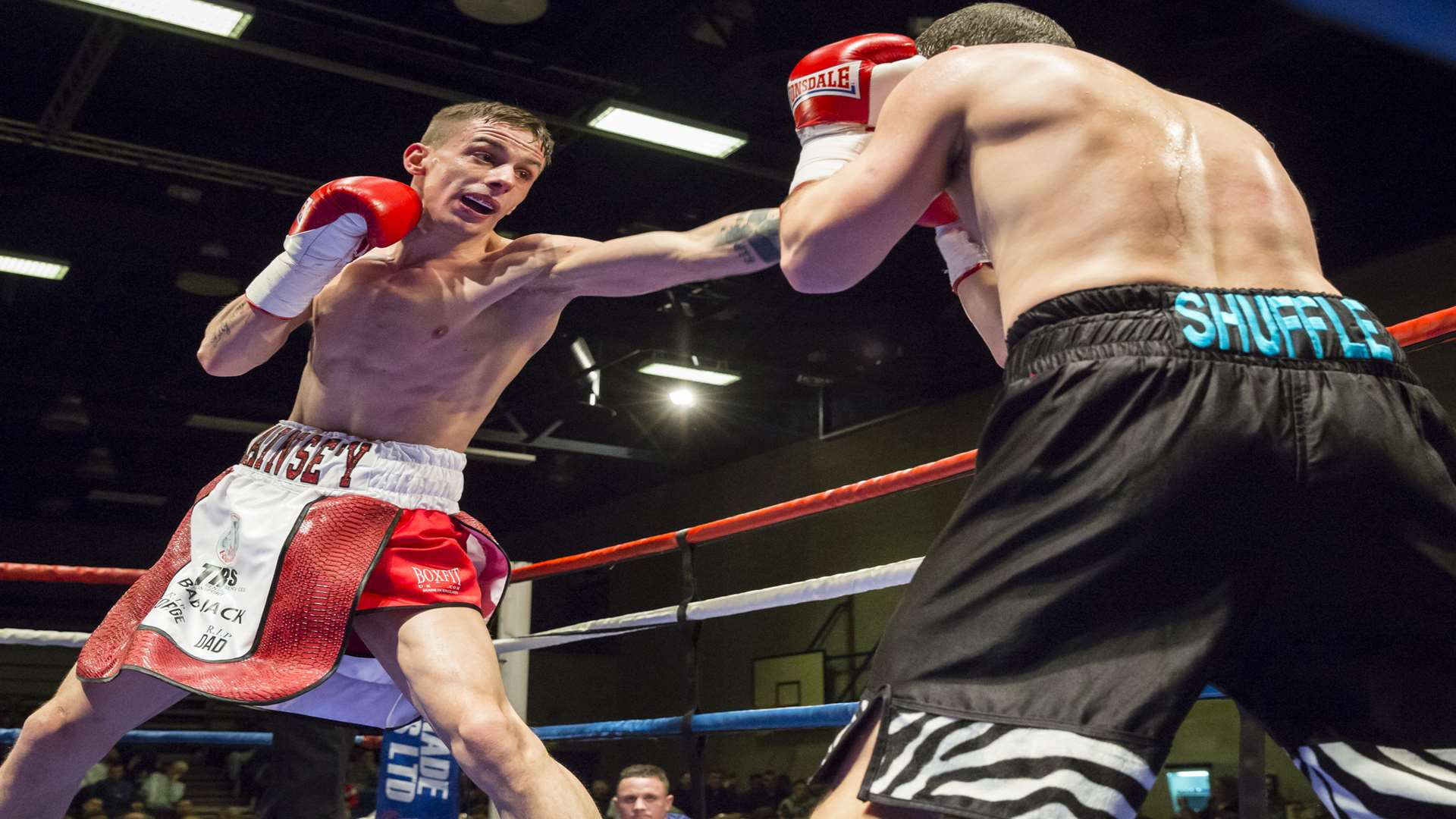 Jack Raines (red trunks) gets to work behind his jab Picture: Countrywide Photographic