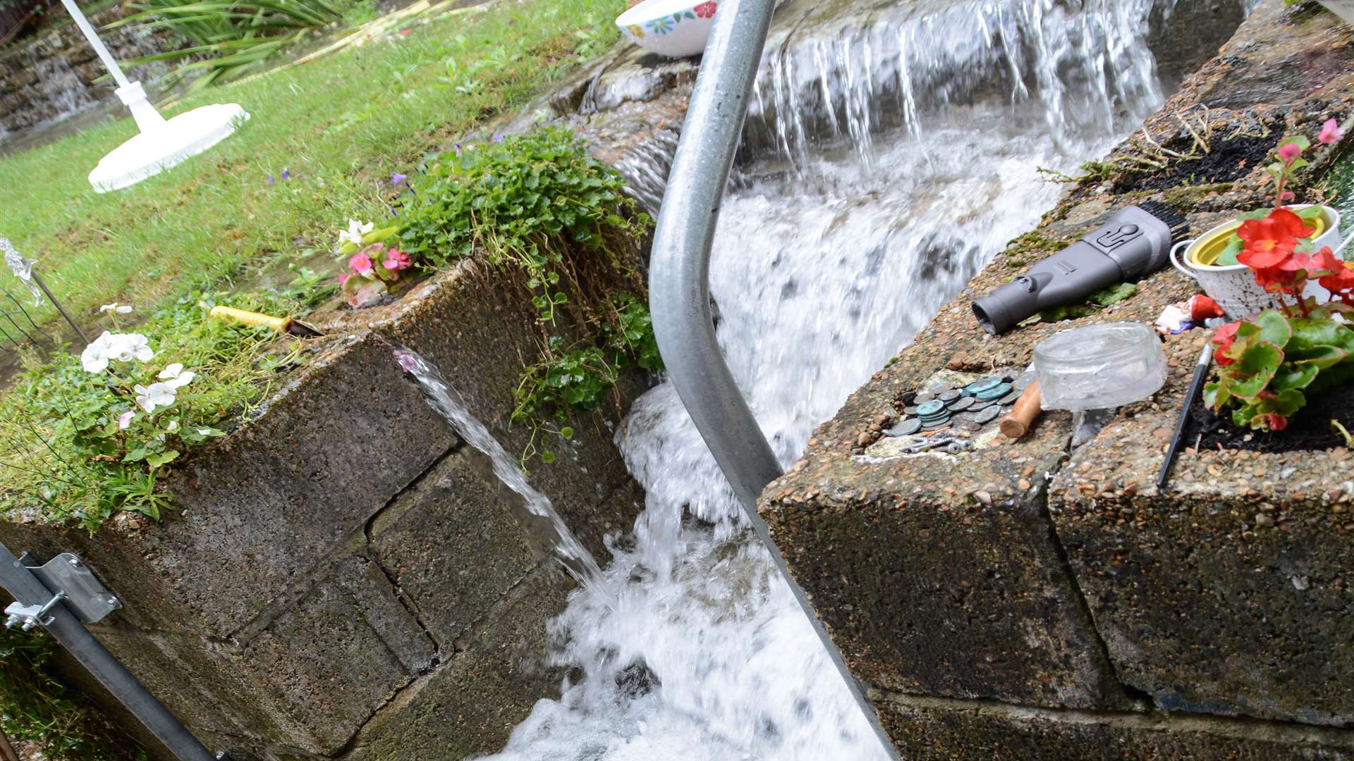 Gardens and homes in Folkestone have been flooded. Credit: Jackie Andrews and Patrick Fowler in Downs Road