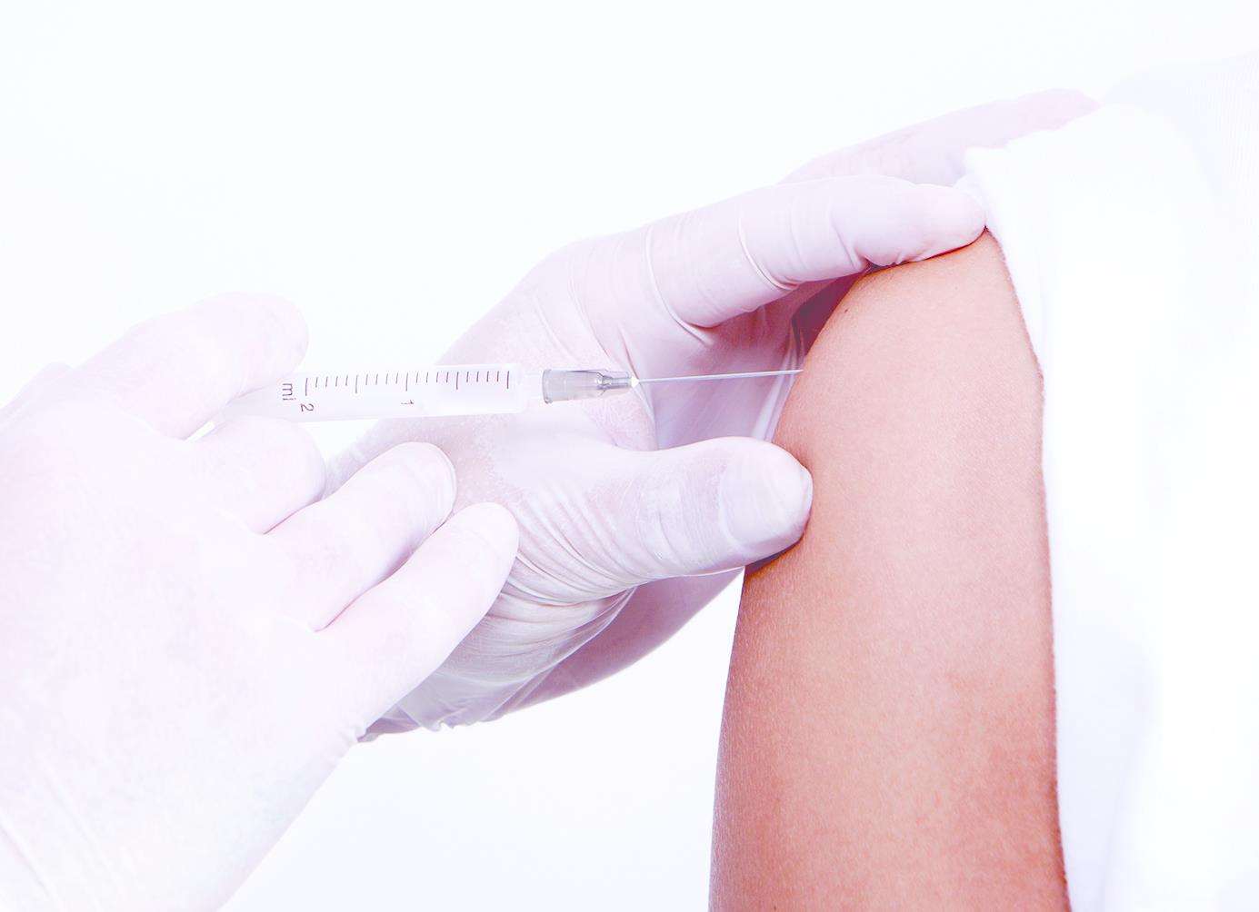 Nurse giving a vaccine for a patient, disease vaccines