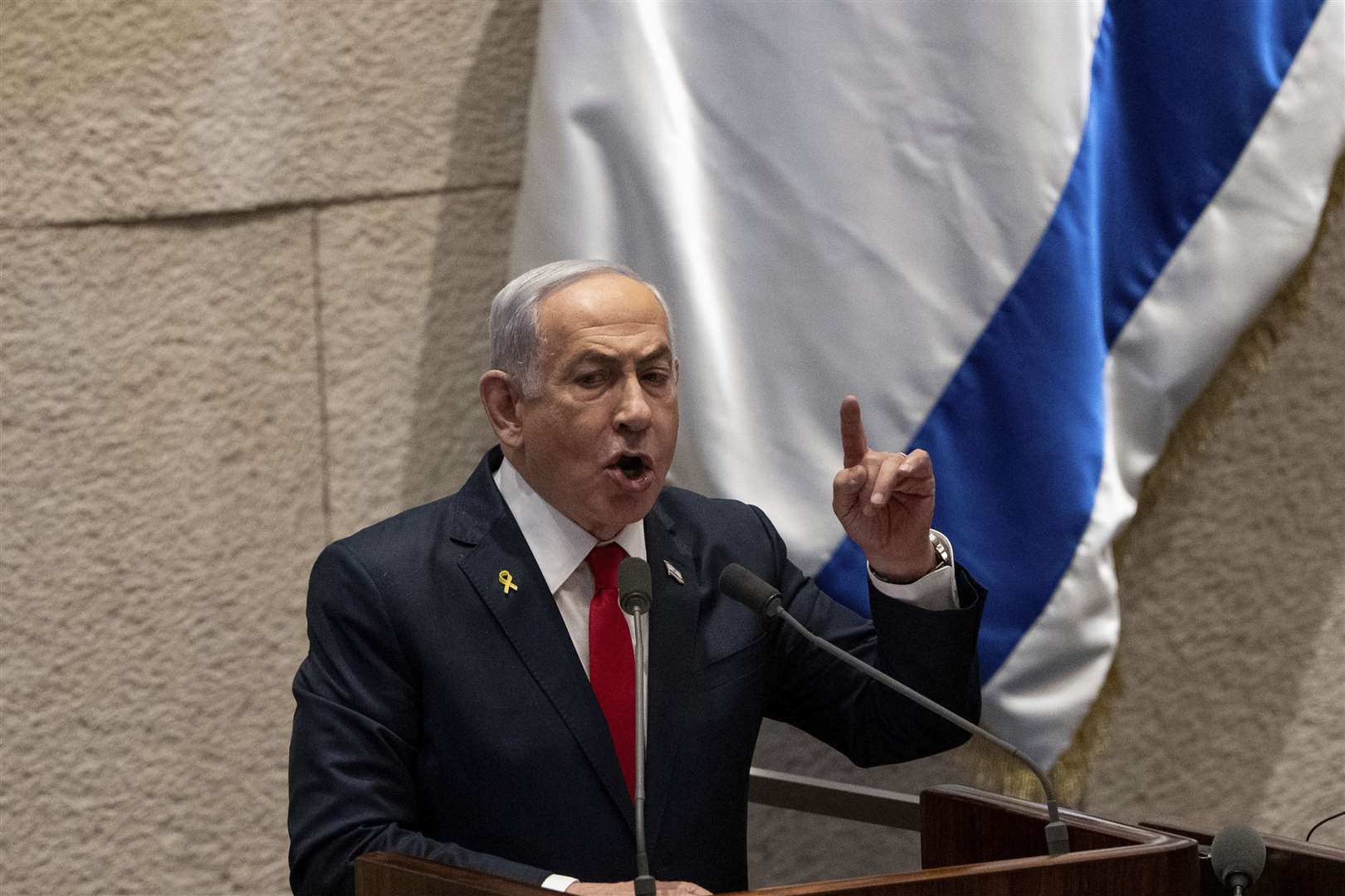 Benjamin Netanyahu addresses Israel’s parliament (Ohad Zwigenberg/AP)