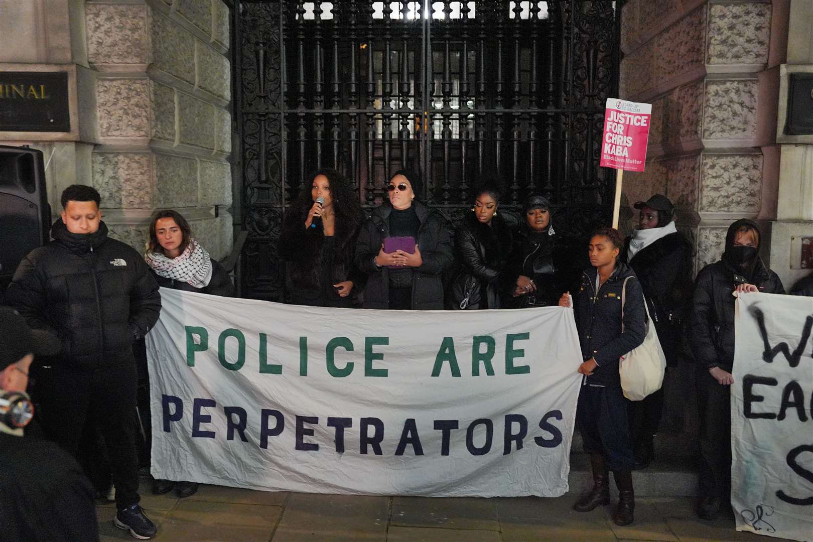 Friends and family of Chris Kaba demonstrate outside the Old Bailey (Jordan Pettitt/PA)