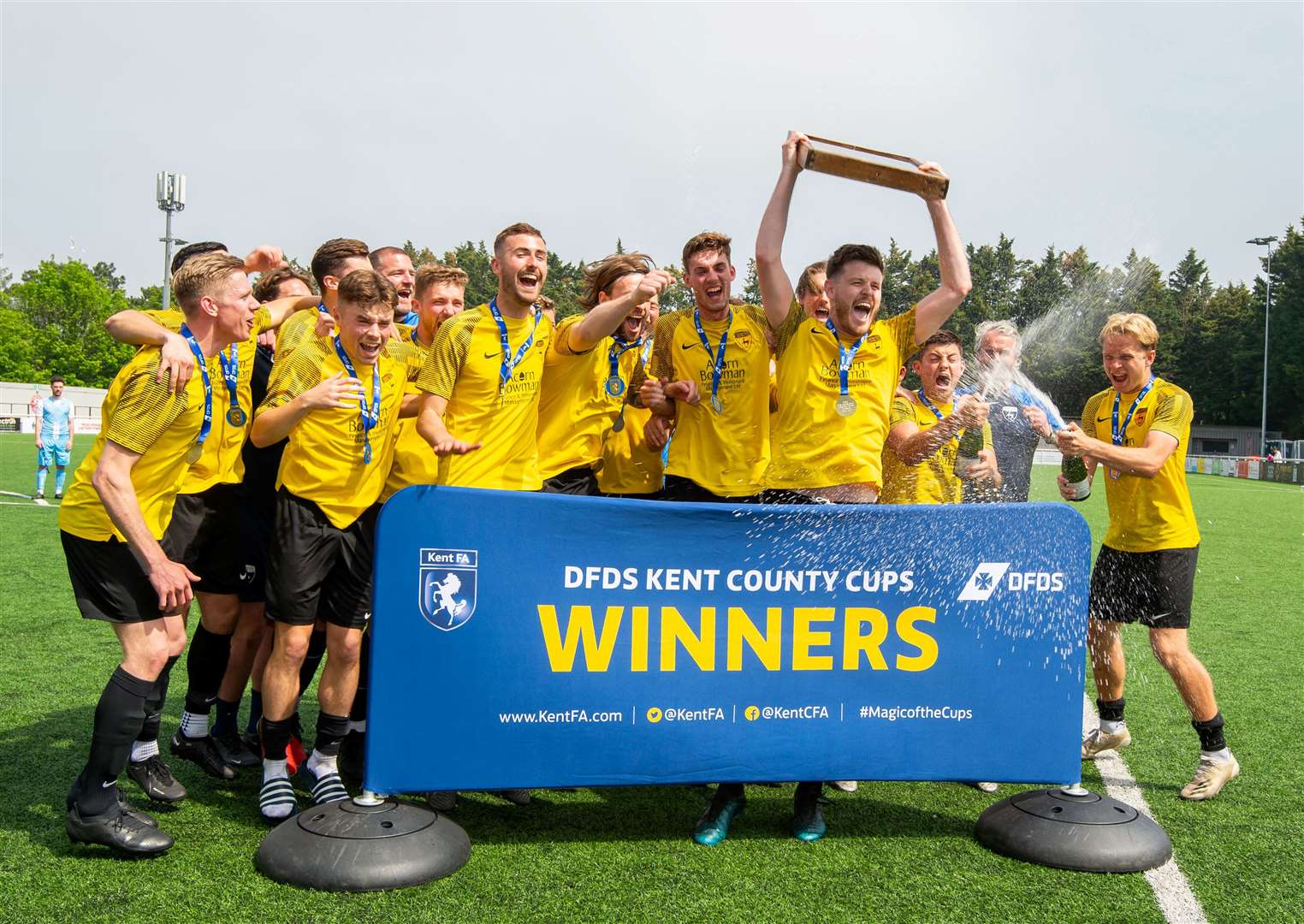 Minster lift the Challenge Shield after winning on penalties Picture: PSP Images