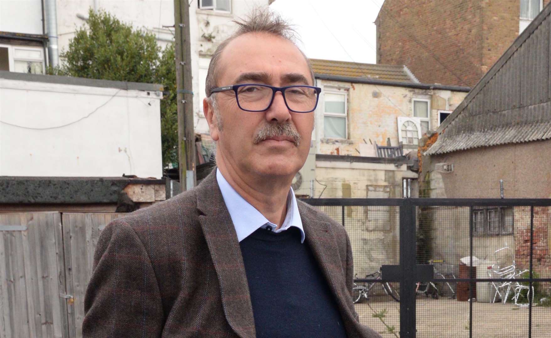 Councillor Andrew Cook at the rear of the former Tivoli arcade