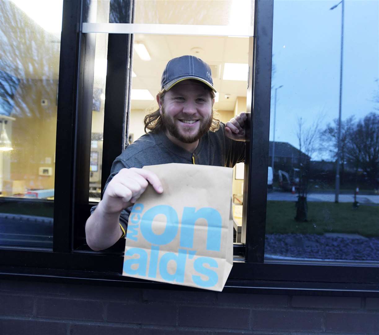 Our man helps out on the drive thru