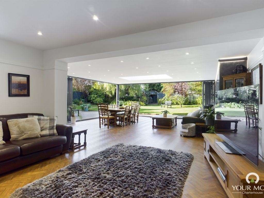 A spacious living room opens up into an even more spacious back garden. Photo: Zoopla