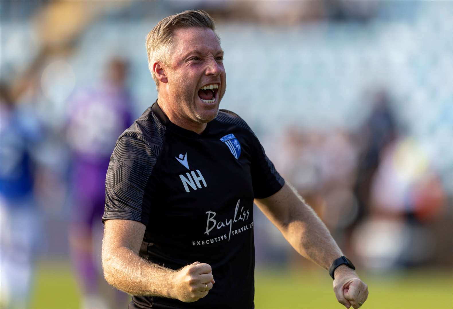 Neil Harris celebrates the 1-0 win over Harrogate in League 2 Picture: @Julian_KPI