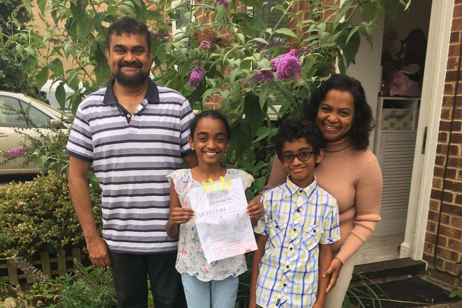 Chandi Dheerasekara, who took the swan to the vets, with daughter Minoli, son Thimal and wife Vasantha