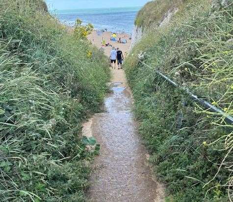 A "waterfall of urine" was "cascading down the steps” to the beach. Picture: Georgia Hubbard