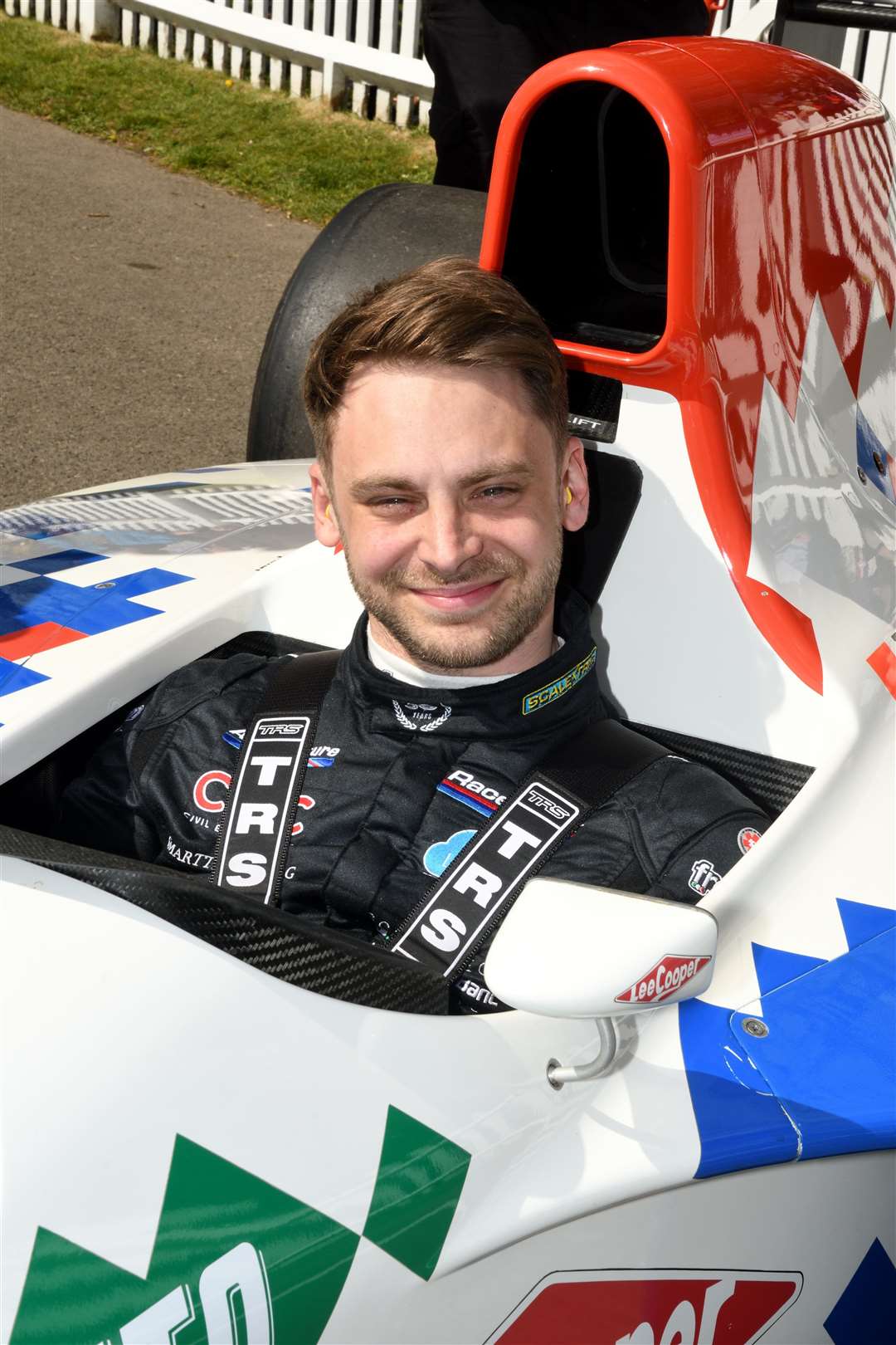 Jake Hill was all smiles in the 1993 Footwork FA14 Grand Prix car. Picture: Simon Hildrew