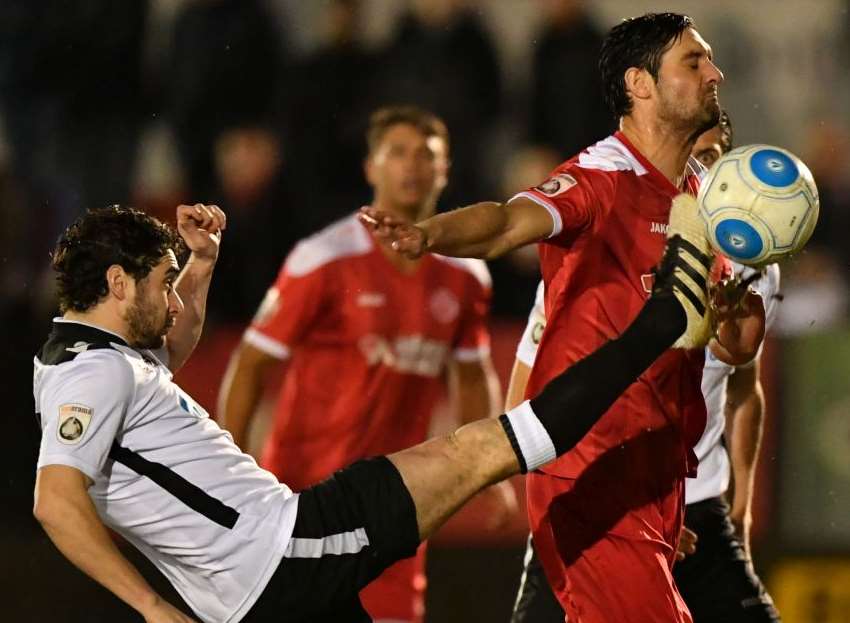 Dartford's Alex Brown wins the ball against Welling's Jamie Slabber. Picture: Keith Gillard