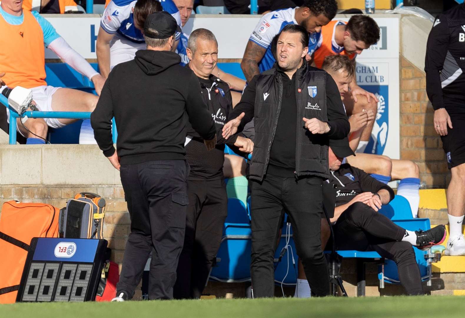 Stephen Clemence and Mark Bonner shake hands before kick-off as Gillingham played Barrow Picture: @Julian_KPI