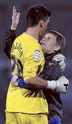 Andy Hessenthaler and Paulo Gazzaniga celebrate at full-time