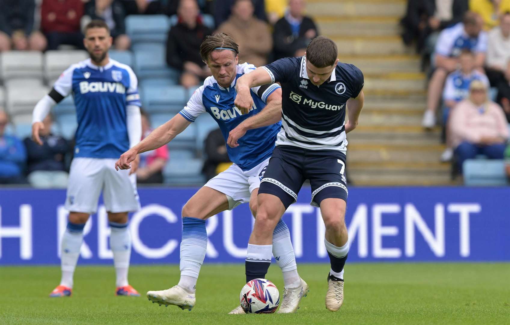 Armani Little battles for possession last weekend as Gillingham player Millwall Picture: Keith Gillard