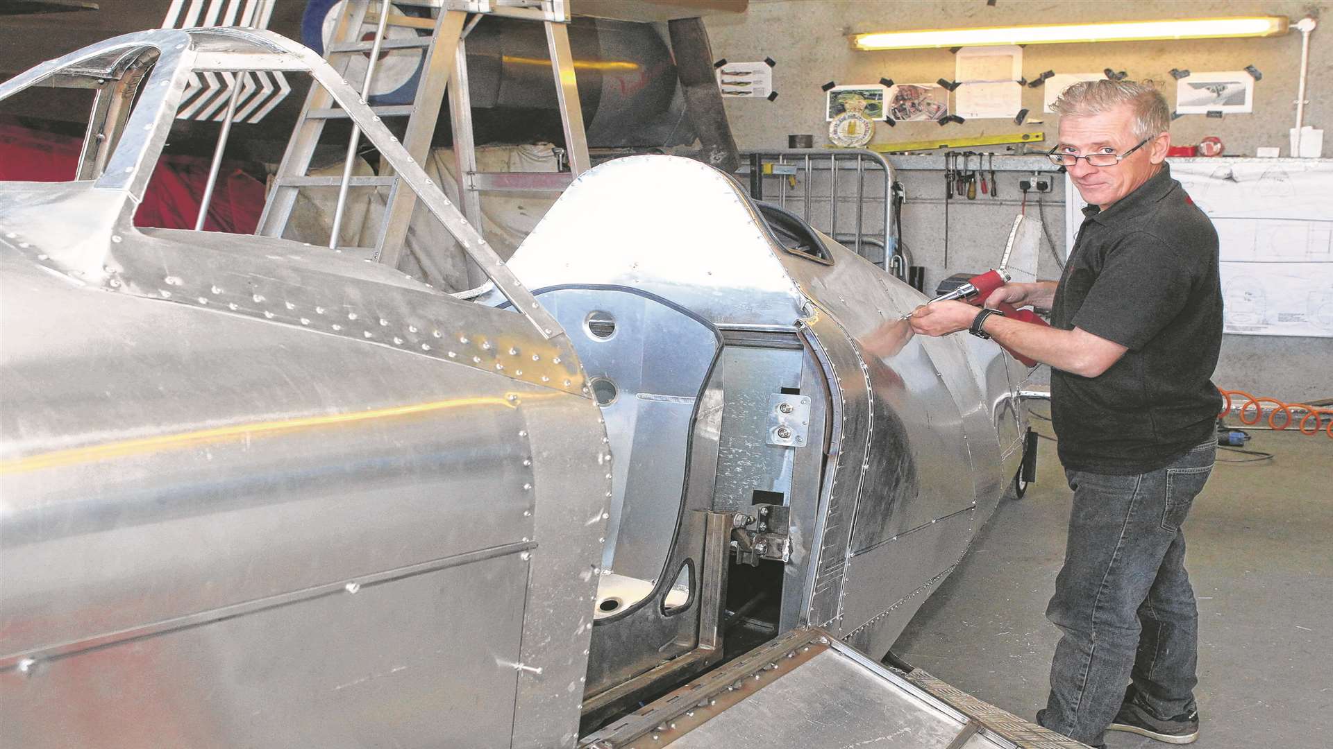 Bob Watson with the scaled half-sized Spitfire