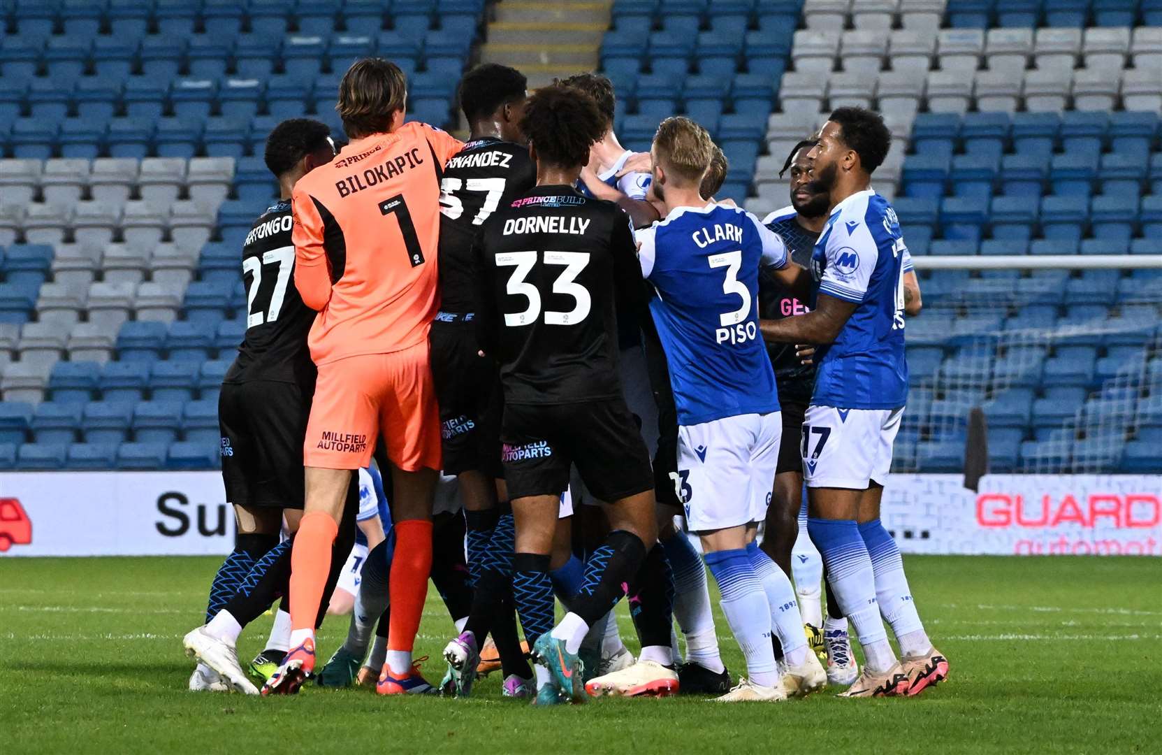 Tempers flare near the end of the opening half resulting in a yellow card for Bradley Dack Picture: Barry Goodwin