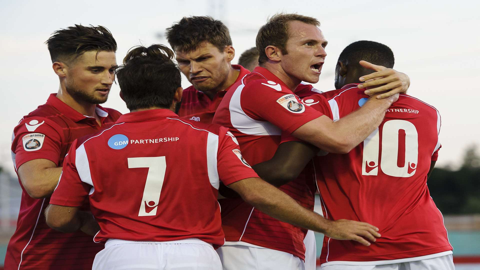 Ebbsfleet celebrate with Anthony Cook (10) after his opening goal Picture: Andy Payton