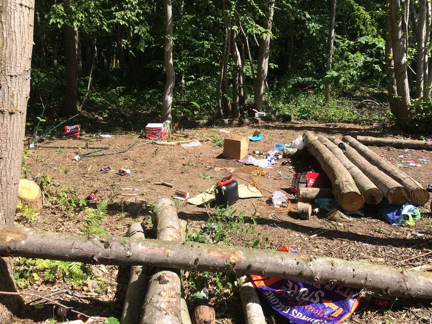 Litter strewn over rave site in the woodland off Harvel Road in Vigo Village, near Gravesend