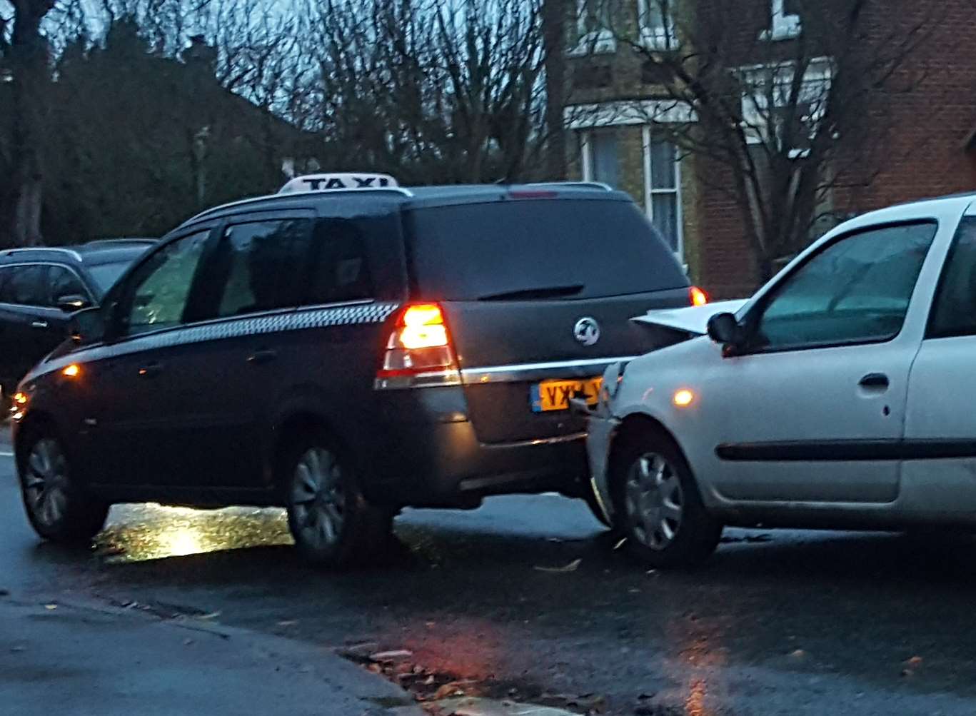 A Renault Clio collided with a taxi