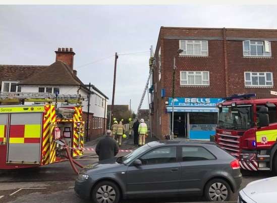 Fire crews outside the burning restaurant