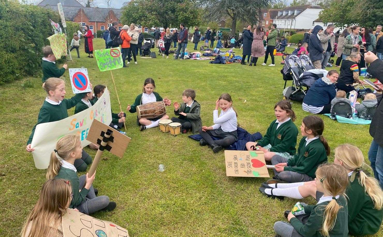 The children of Slade Primary School make their views on the proposed extension of Castle Fields car park known